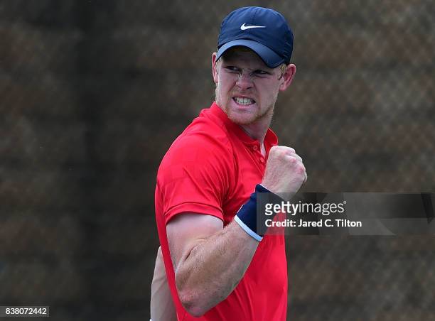 Kyle Edmund of Great Britain reacts after a point against Marton Fucsovics of Hungary during the fifth day of the Winston-Salem Open at Wake Forest...