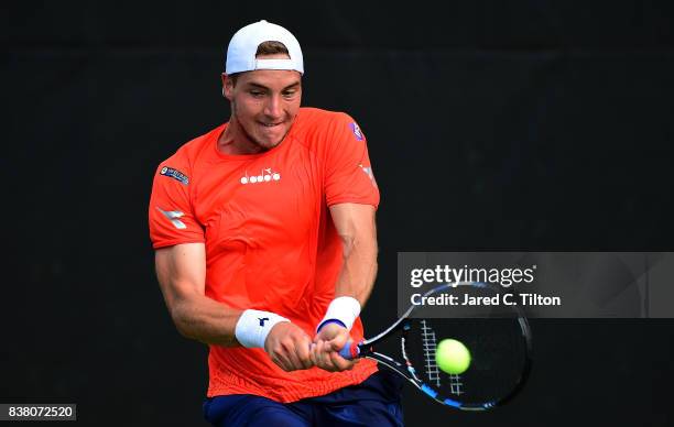 Jan-Lennard Struff of Germany returns a shot to Andreas Seppi of Italy during the fifth day of the Winston-Salem Open at Wake Forest University on...