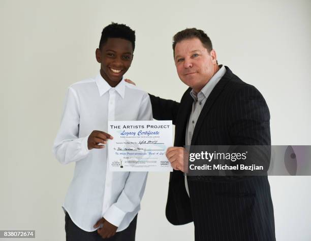 Jie Jordan receives certificate from Lyle Howry at Don Most Visits At TAP - The Artists Project on August 23, 2017 in Los Angeles, California.