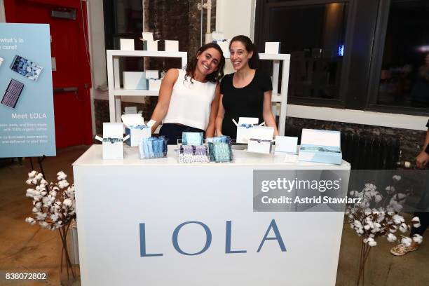 Lola Co-Founders Jordana Kier and Alexandra Friedman pose with their booth during the "CHAMPION EQUALITY. MAKE IT YOUR BUSINESS." panel event hosted...