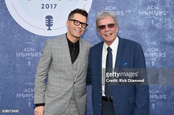 Radio Personalities Bobby Bones and Bob Kingsley arrive at the 11th Annual ACM Honors at the Ryman Auditorium on August 23, 2017 in Nashville,...