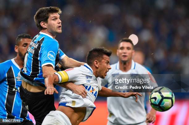 Henrique of Cruzeiro and Kannemann of Gremio battle for the ball during a match between Cruzeiro and Gremio as part of Copa do Brasil Semi-Finals...