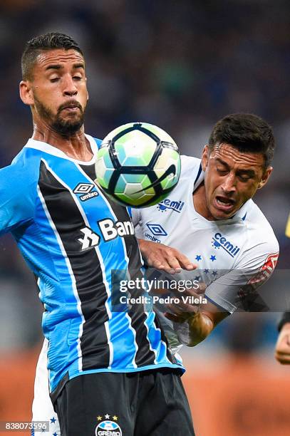 Robinho of Cruzeiro and Lucas Barrios of Gremio battle for the ball during a match between Cruzeiro and Gremio as part of Copa do Brasil Semi-Finals...