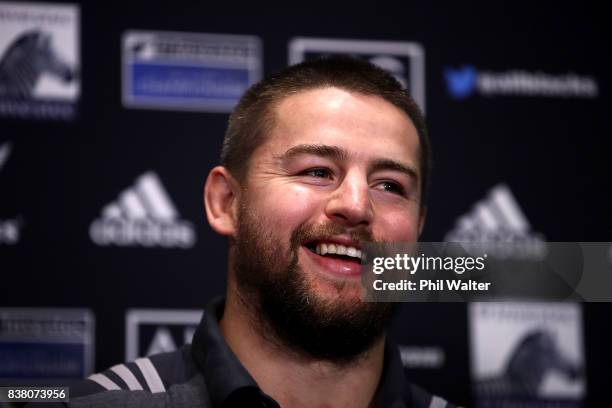 Dane Coles of the All Blacks speaks to media during a media session at the Southern Cross motel before the New Zealand All Blacks training session at...