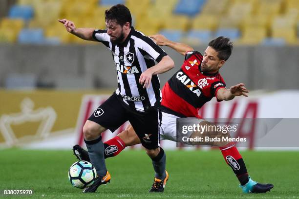 Diego of Flamengo struggles for the ball with Joao Paulo of Botafogo during a match between Flamengo and Botafogo part of Copa do Brasil Semi-Finals...