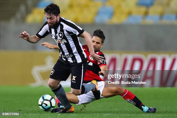 Diego of Flamengo struggles for the ball with Joao Paulo of Botafogo during a match between Flamengo and Botafogo part of Copa do Brasil Semi-Finals...