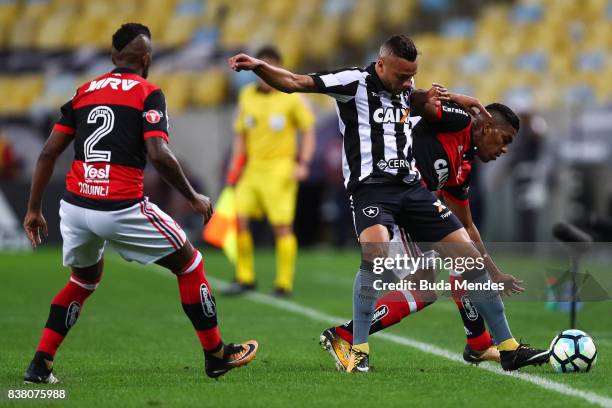 Orlando Berro of Flamengo struggles for the ball with Guilherme of Botafogo during a match between Flamengo and Botafogo part of Copa do Brasil...