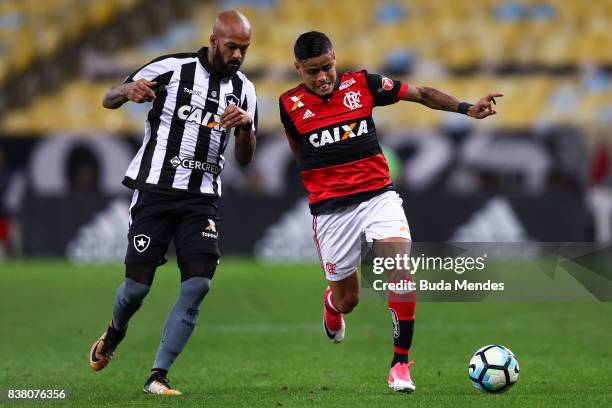 Everton of Flamengo struggles for the ball with Bruno Silva of Botafogo during a match between Flamengo and Botafogo part of Copa do Brasil...