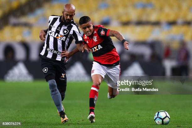 Everton of Flamengo struggles for the ball with Bruno Silva of Botafogo during a match between Flamengo and Botafogo part of Copa do Brasil...