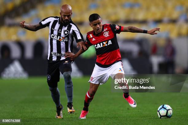 Everton of Flamengo struggles for the ball with Bruno Silva of Botafogo during a match between Flamengo and Botafogo part of Copa do Brasil...