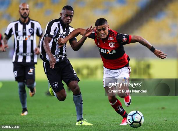 Everton of Flamengo struggles for the ball with Marcelo Conceio of Botafogo during a match between Flamengo and Botafogo part of Copa do Brasil...