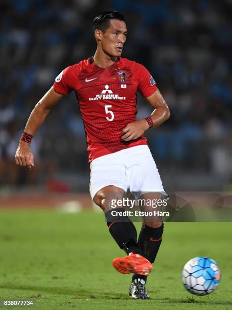 Tomoaki Makino of Urawa Red Diamonds in action during the AFC Champions League quarter final first leg match between Kawasaki Frontale and Urawa Red...