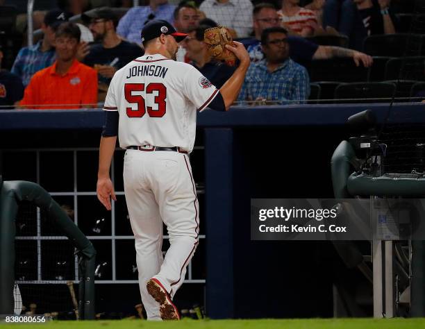 Jim Johnson of the Atlanta Braves looks to the stands after being pulled in the eighth inning against the Seattle Mariners at SunTrust Park on August...