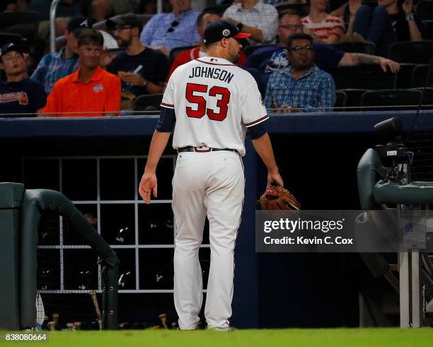 Jim Johnson of the Atlanta Braves looks to the stands after being pulled in the eighth inning against the Seattle Mariners at SunTrust Park on August...