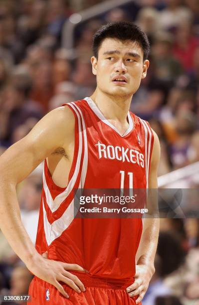 Yao Ming of the Houston Rockets looks up court during the game against the Phoenix Suns on November 12, 2008 at US Airways Center in Phoenix,...