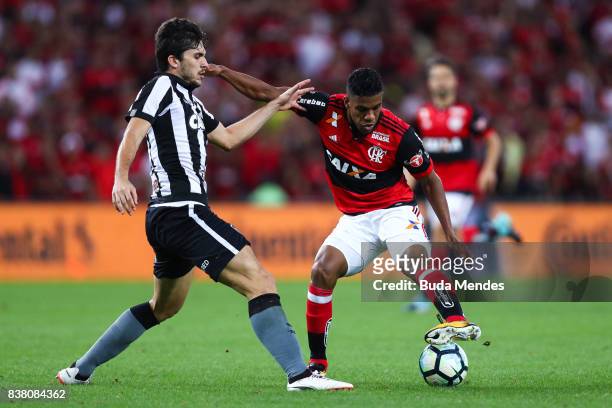 Orlando Berro of Flamengo struggles for the ball with Igor Rabello of Botafogo during a match between Flamengo and Botafogo part of Copa do Brasil...