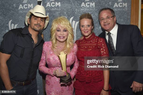 Brad Paisley, Dolly Parton, and ACM's Tiffany Moon and Pete Fisher attend the 11th Annual ACM Honors at the Ryman Auditorium on August 23, 2017 in...