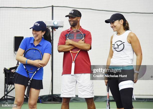 Sportscaster Michelle Yu, American tennis player James Blake and CEO of Flywheel Sarah Robb O'Hagan participate in tennis match to support the 2017...