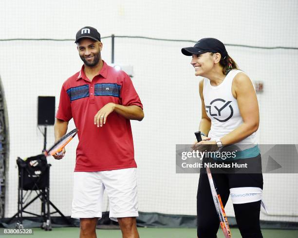 American tennis player James Blake and CEO of Flywheel Sarah Robb O'Hagan participate in tennis match to support the 2017 AKTIV Against Cancer Tennis...