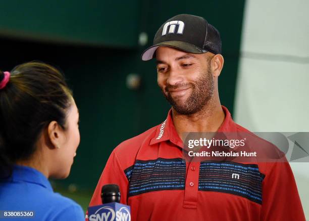 Sportscaster Michelle Yu interviews American tennis player James Blake at the tennis match to support the 2017 AKTIV Against Cancer Tennis Pro-Am at...