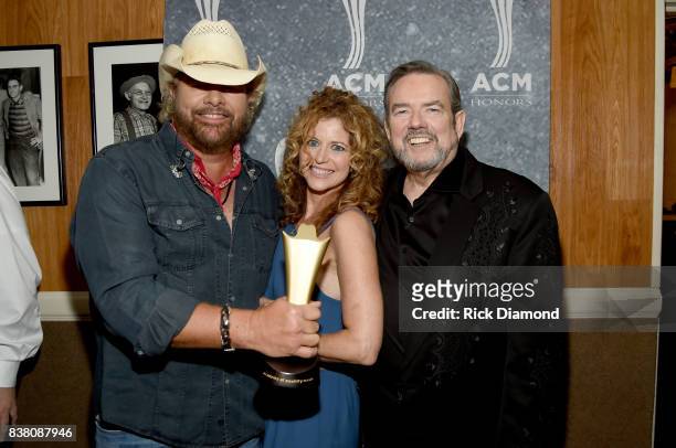 Toby Keith, Laura Savini and Jimmy Webb attend the 11th Annual ACM Honors at the Ryman Auditorium on August 23, 2017 in Nashville, Tennessee.
