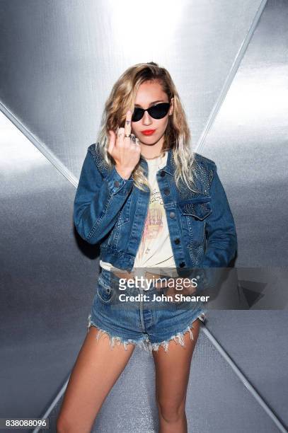 Miley Cyrus poses backstage during rehearsals for the 2017 MTV Video Music Awards at The Forum on August 23, 2017 in Inglewood, California.