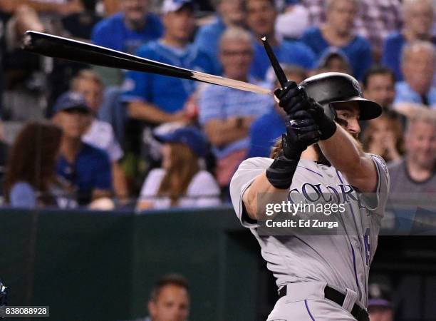Charlie Blackmon of the Colorado Rockies breaks his bat as he fouls the ball off in the sixth inning against the Kansas City Royals at Kauffman...