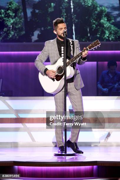 Singer-songwriter Thomas Rhett performs onstage during the 11th Annual ACM Honors at the Ryman Auditorium on August 23, 2017 in Nashville, Tennessee.