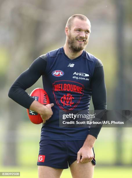 Max Gawn of the Demons looks on during a Melbourne Demons AFL training session at Gosch's Paddock on August 24, 2017 in Melbourne, Australia.