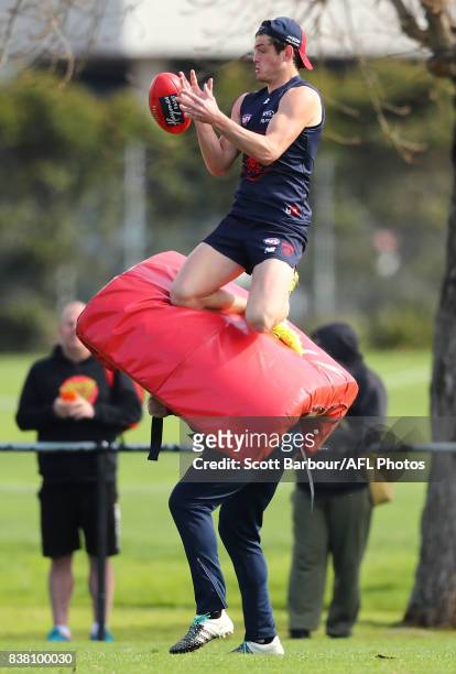 Angus Brayshaw of the Demons amarks the ball during a Melbourne Demons AFL training session at Gosch's Paddock on August 24, 2017 in Melbourne,...