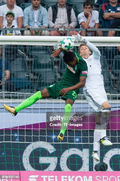 Theodor Gebre Selassie of Bremen und Goalkeeper Christian Fruechtl of Bayern Muenchen battle for the ball during the Telekom Cup 2017 Final between...