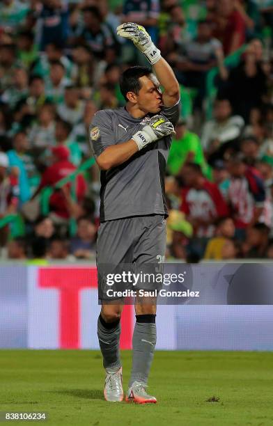 Rodolfo Cota of Chivas, celebrates the first goal of his team scored by his teammate Angel Zaldívar during the sixth round match between Santos...