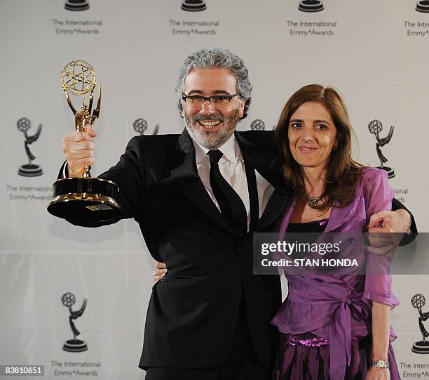 Executive Producers Claudio Villarruel and Bernarda Llorente of Argentina celebrate the award in the TV Movie/Mini-Series category for "Television...