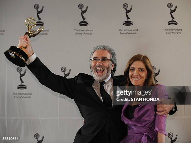 Executive Producers Claudio Villarruel and Bernarda Llorente of Argentina celebrate the award in the TV Movie/Mini-Series category for "Television...