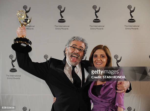 Executive Producers Claudio Villarruel and Bernarda Llorente of Argentina celebrate the award in the TV Movie/Mini-Series category for "Television...
