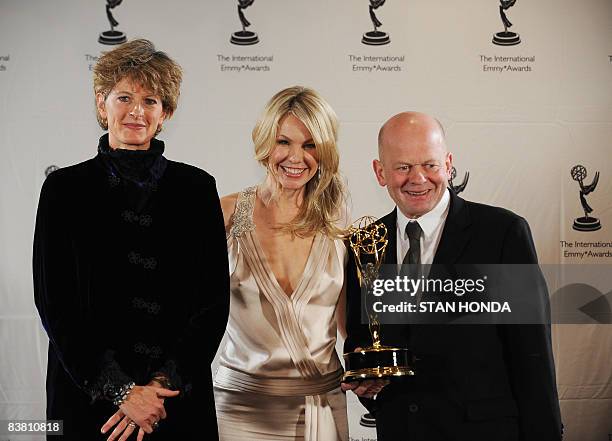 Producer/Director Louise Osmond and Executive Producer John Smithson of Britain hold the award for Documentary for "The Beckoning Silence" with...