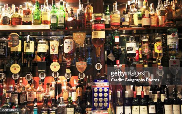 Bottles of spirits bar display inside the Temple Bar pub, Dublin city center, Ireland, Republic of Ireland.