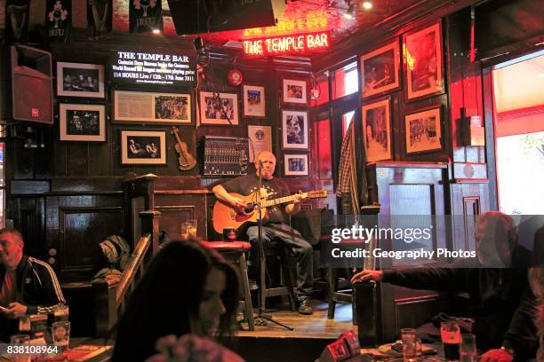 Live music performance inside the Temple Bar pub, Dublin city center, Ireland, Republic of Ireland.