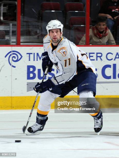 David Legwand of the Nashville Predators skates with the puck during a NHL game against the Carolina Hurricanes on November 23, 2008 at RBC Center in...