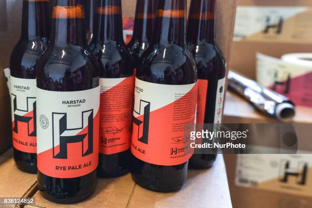 View of bottles of Harstad Rye Pale Ale beer inside the Harstad Brewery, a company owned by Tom Dahlberg, that brews Harstad local beer in both...