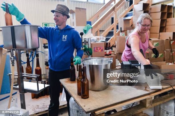 View of bottles of Harstad Rye Pale Ale beer inside the Harstad Brewery, a company owned by Tom Dahlberg, that brews Harstad local beer in both...