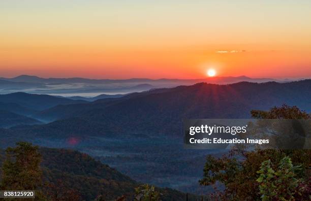 Brevard North Carolina mountains near Asheville Fall Colors Blue Ridge Highway sunrise hills ridges.