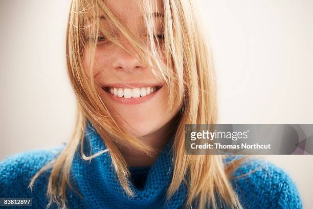 young woman, eyes closed portrait - toothy smile stock pictures, royalty-free photos & images
