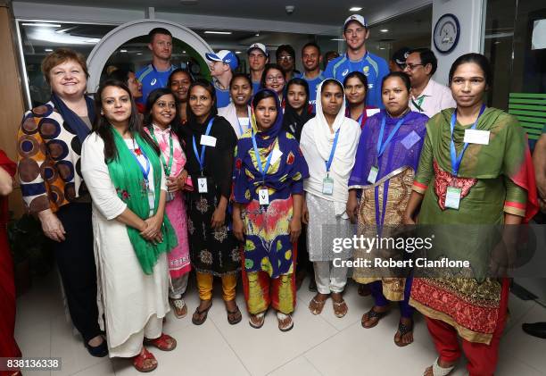 Steve Smith, Jackson Bird, Mitchell, Usman Khawaja, Swepson, Josh Hazlewood and Hilton Cartwright of Australia meet families affected by the recent...