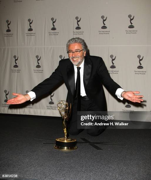 Recipient of the International Emmy TV Movie/Mini-Series Award for "Television por la identidad", executive producer Claudio Villarruel celebrates at...