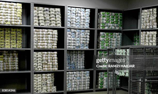 Lebanese lira bills are packed on shelves inside a safe at Lebanon's Central Bank in Beirut on November 24, 2008. Lebanon for now has managed to...