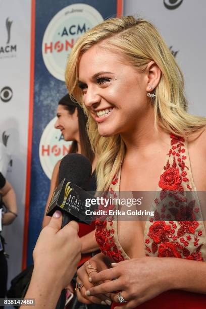 Kelsea Ballerini is interviewed on the red carpet during the 11th Annual ACM Honors at the Ryman Auditorium on August 23, 2017 in Nashville,...