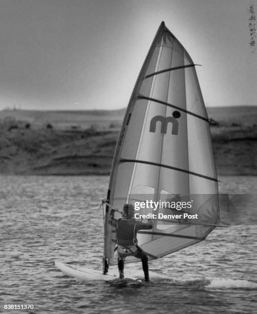 Sail Boarding Tom Longan age 23 is board sailing on Chatfield Res. He lives in Parker Colo Credit: The Denver Post