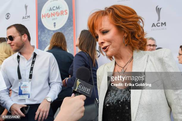 Reba McEntire is interviewed on the red carpet during the 11th Annual ACM Honors at the Ryman Auditorium on August 23, 2017 in Nashville, Tennessee.