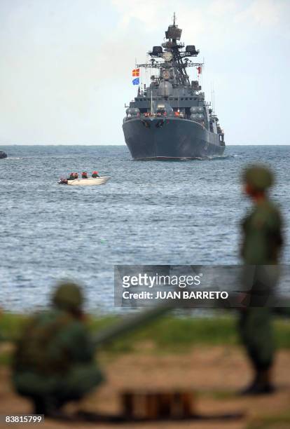 Venezuelan marines look at Russian Udaloy-class Admiral Chabanenko anti-submarine vessel, upon her arrival at the port of La Guaira, 30 km from...